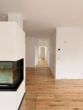 Einzigartiges Wohnen am See – Exklusive Wohnung mit Privatgarten - Blick Richtung Schlafbereich