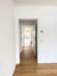 Einzigartiges Wohnen am See – Exklusive Wohnung mit Privatgarten - Blick aus Schlafen 1