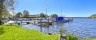 Einzigartiges Wohnen am See – Exklusive Wohnung mit Privatgarten - Bootsanleger