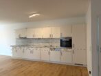 Einzigartiges Wohnen am See – Exklusive Wohnung mit Privatgarten - Die Einbauküche