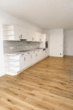 Einzigartiges Wohnen am See – Exklusive Wohnung mit Privatgarten - Einbauküche mit Miele Geräten