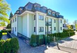 Einzigartiges Wohnen am See – Exklusive Wohnung mit Privatgarten - Hausansicht