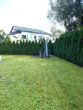 Einzigartiges Wohnen am See – Exklusive Wohnung mit Privatgarten - Im Garten