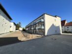 Gepflegte 4-Zimmer-Neubauwohnung im Herzen von Nauen zu vermieten - Rückseite Vorderhaus