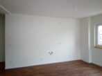 Gepflegte 4-Zimmer-Neubau-Wohnung im Herzen von Nauen zu vermieten - Küchenwand