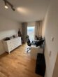 Gepflegte 1-Zimmer-Wohnung mit Terrasse sucht Nachmieter - Wohn- und Schlafzimmer mit Zugang zur Terrasse