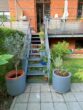 Gepflegte 3-Zimmer-Wohnung mit Balkon und Garten in Berlin-Rummelsburg zu vermieten - Zugangstreppen zum eigenen Garten