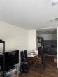 Gepflegte 2-Zimmer Neubau-Wohnung im Herzen von Nauen zu vermieten - Wohnzimmer mit offener Küche
